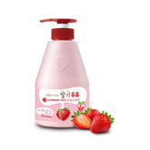Pink strawberry milk body lotion with red pump on a white background