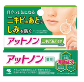 Packaging of a skincare product with a close-up of skin and text in Japanese.