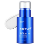 Blue skincare bottle with white cap on a white background