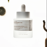SKIN1004 Niacinamide 10 Boosting Ampoule 30ml white dropper bottle on grey background