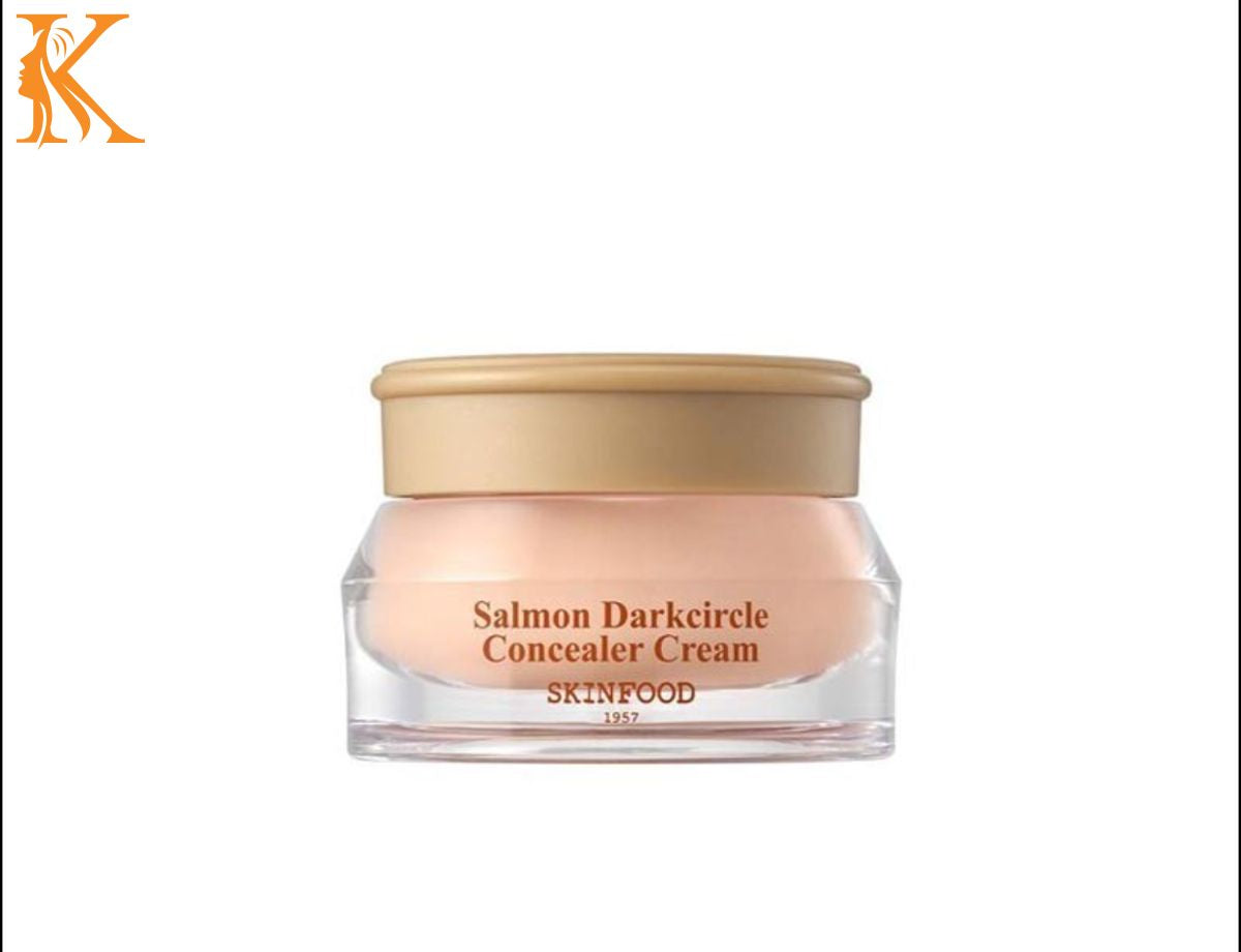 Skinfood Salmon Darkcircle Concealer Cream jar with gold lid on a white background