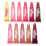 UNLEASHIA Sunset Dazzle Gloss Balm collection in multiple shades including pink, nude and brown on white background